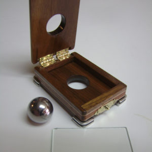 Steel Ball Through Glass